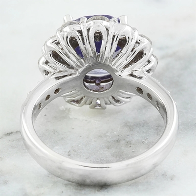 Câu lạc bộ kim hoàn 1/4 Carat T.G.W. Nhẫn bạc tazanite và kim cương trắng