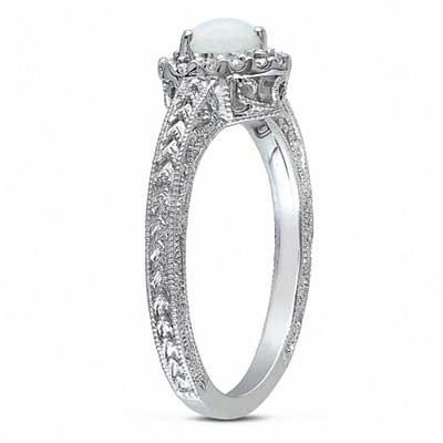 Opal hình trái tim 5.0mm và 1/8 CT. T.W. Nhẫn khung kim cương bằng bạc
